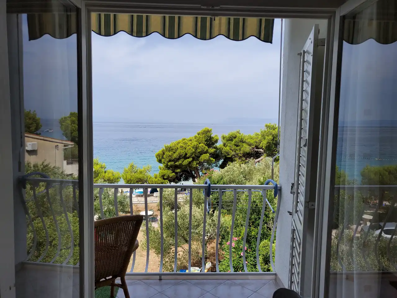 Sunny balcony of a second-floor apartment